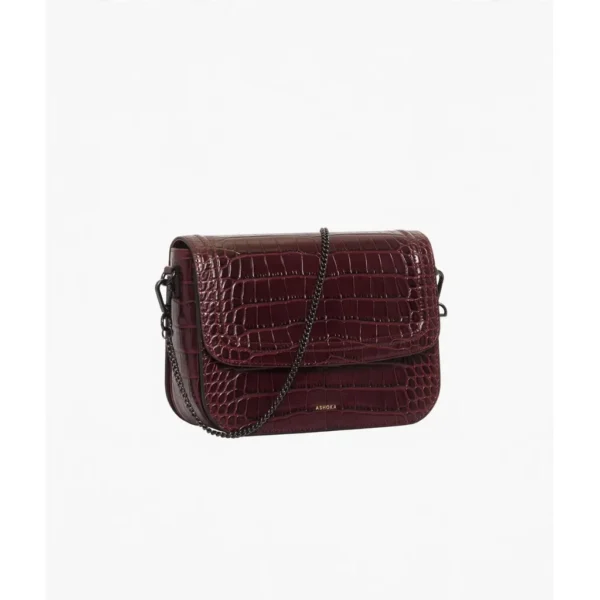 Burgundy Crocodile-Embossed Crossbody Bag — IT Blacksmiths (Burgundy vegan leather crossbody with crocodile embossing, polished gold-tone hardware, removable strap.)