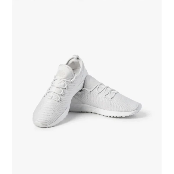 White Leather Low-Top Sneakers — IT Blacksmiths (Minimal white leather sneakers with perforated toe box and vulcanised rubber sole. A clean foundation for everyday streetwear.)